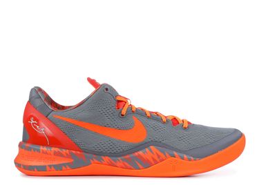 grey nikes with orange swoosh
