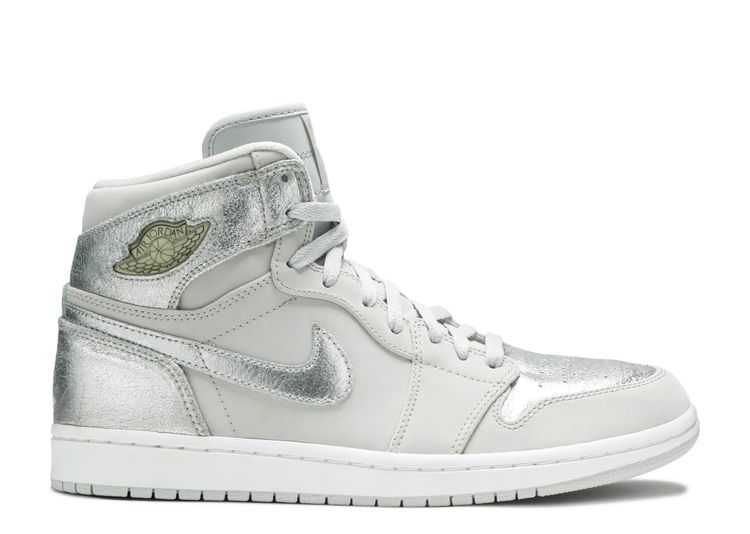 silver and white jordan 1