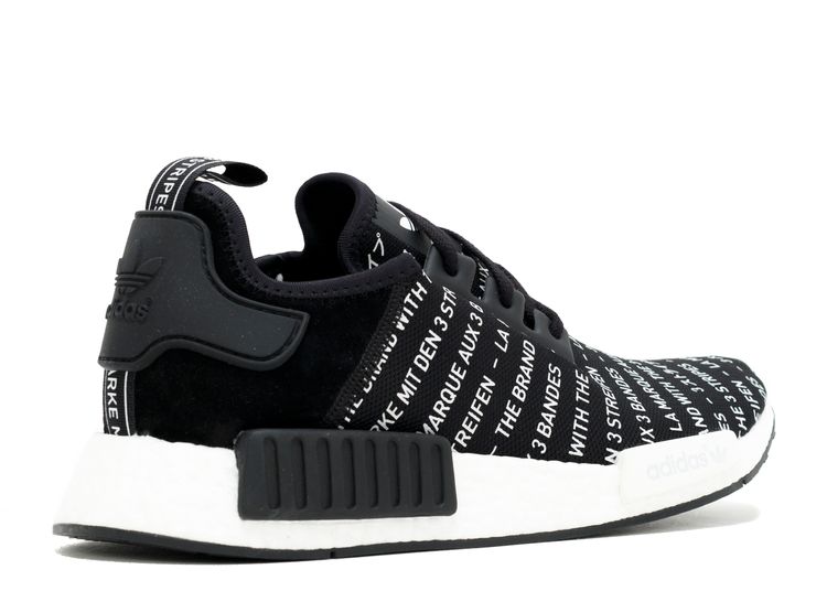 white nmd with black stripes