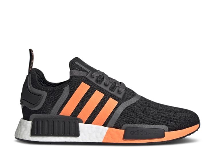 adidas originals nmd_r1 trainers in black with orange stripes