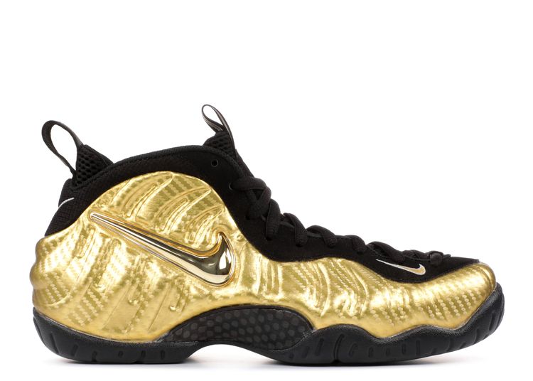 gold and black nike shoes