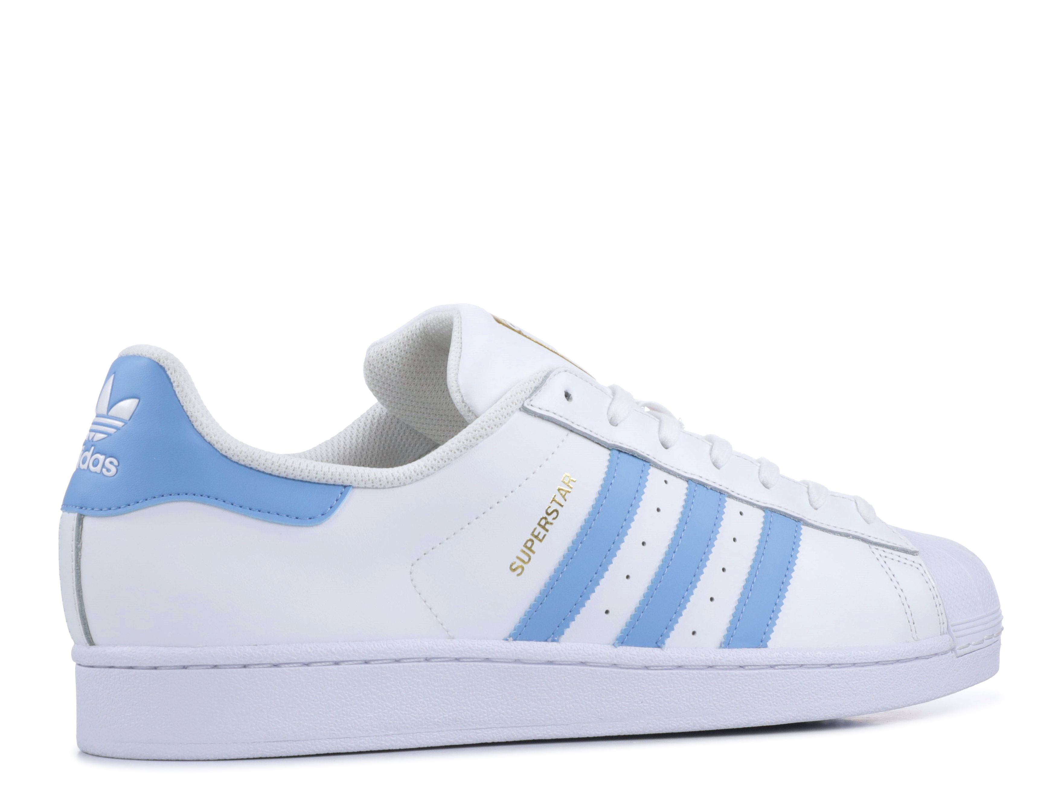 white and light blue adidas