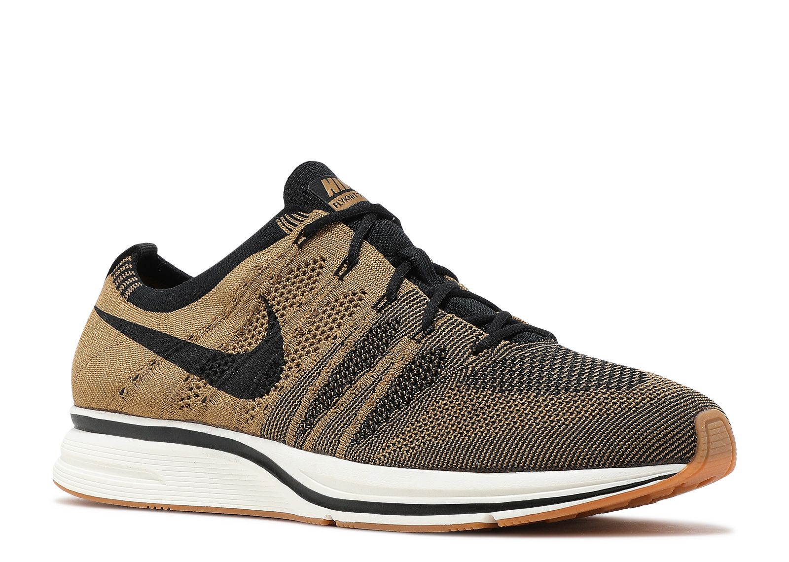 black nike trainers with gold tick