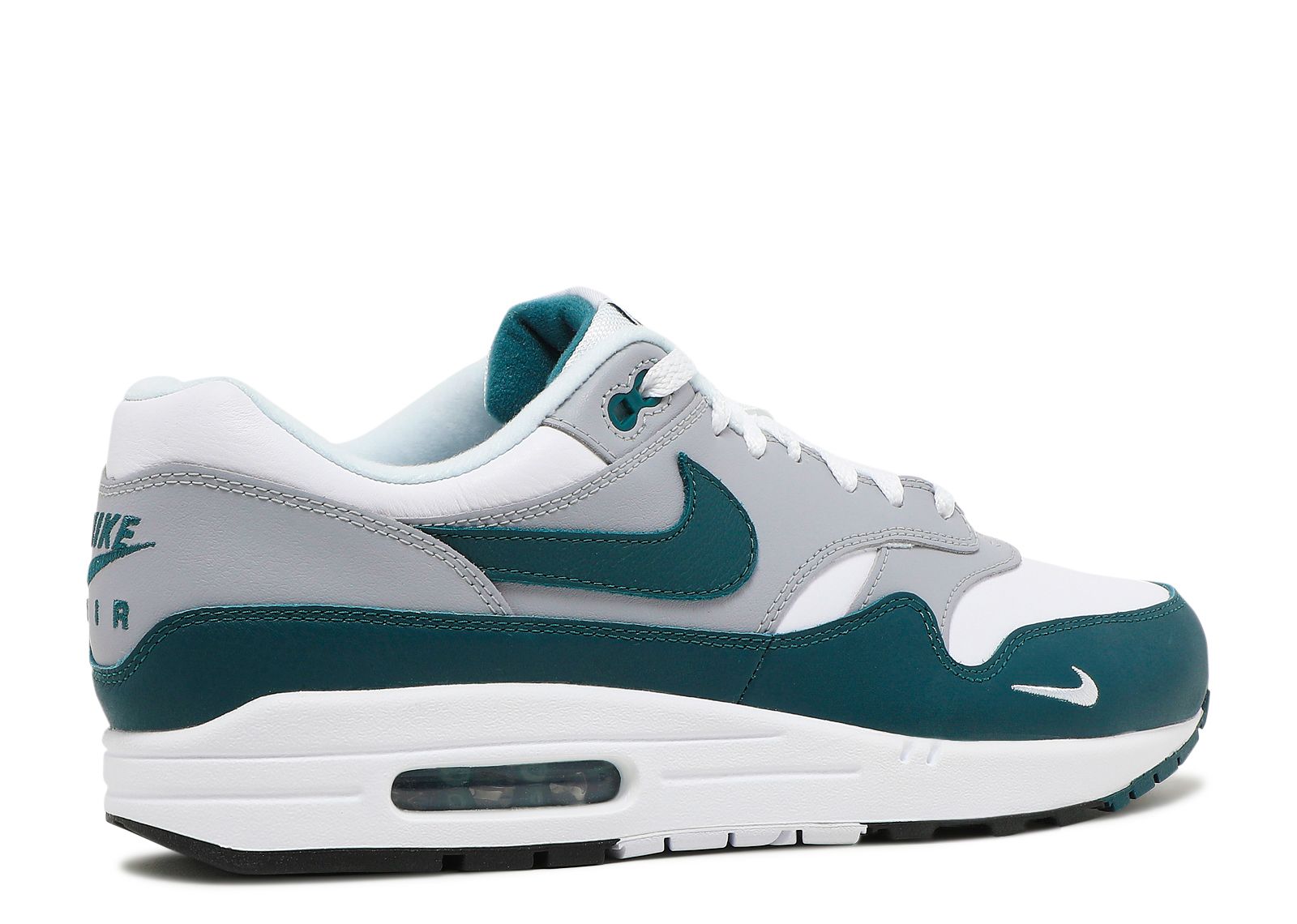 white and teal nikes