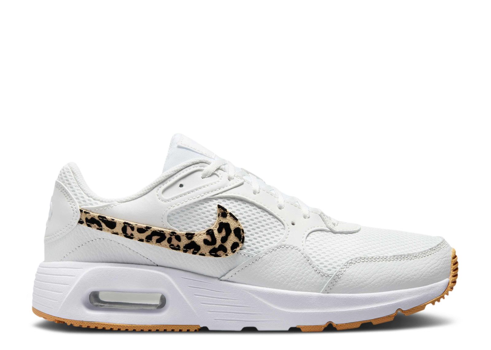 white nike shoes with cheetah swoosh