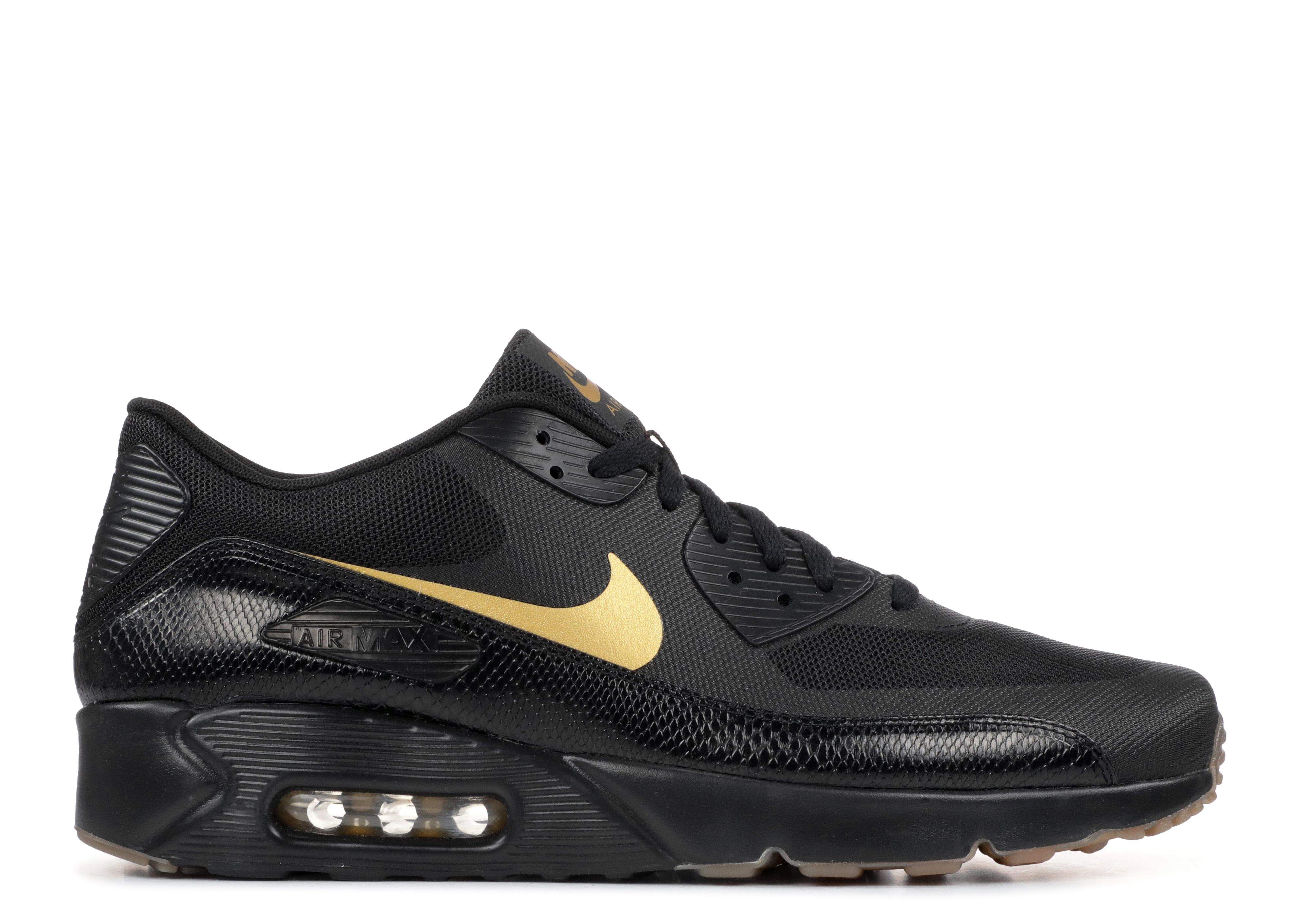 black and gold nike air shoes