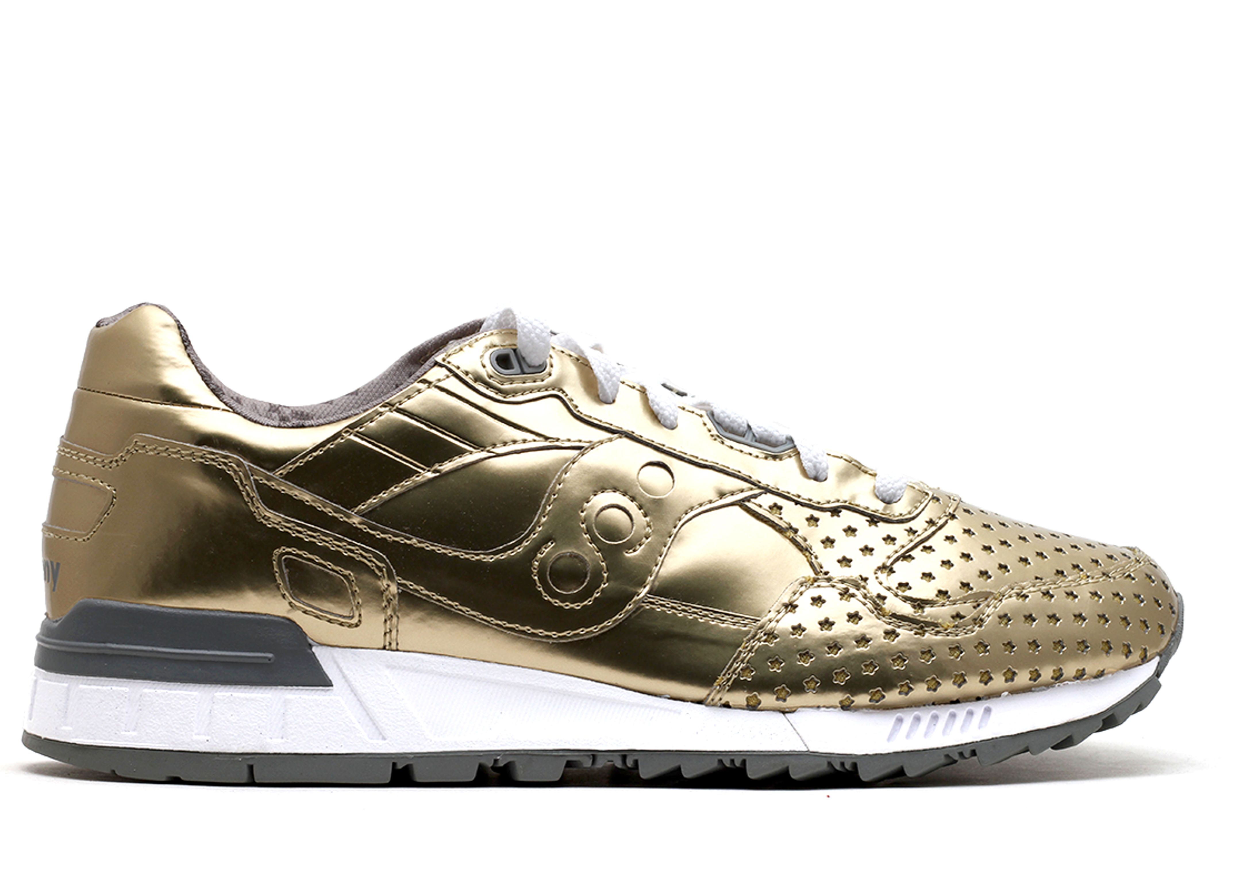 Saucony play shop cloths gold